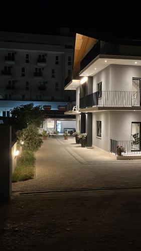 an empty parking lot in a building at night at Vila Lazri in Shëngjin