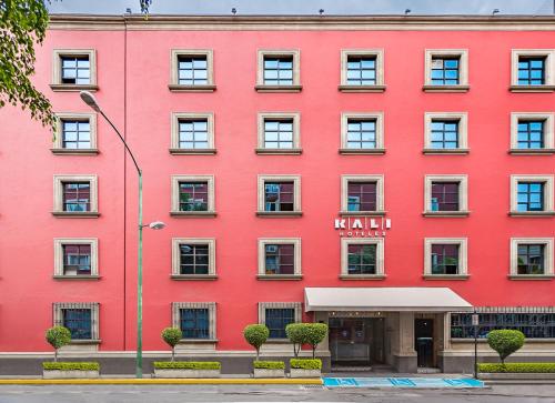 un edificio rosso con un cartello che dice khalili di Kali Ciudadela Mexico City a Città del Messico