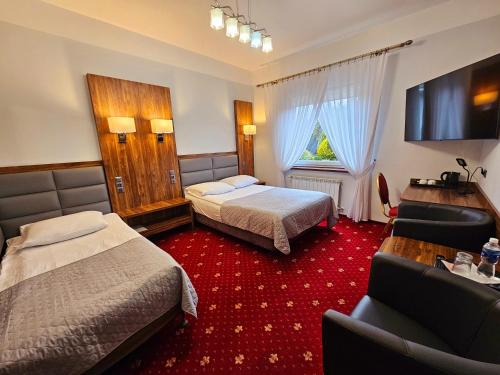 Кровать или кровати в номере Hotel Hawana