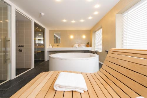 Een badkamer bij Hotel Katoen