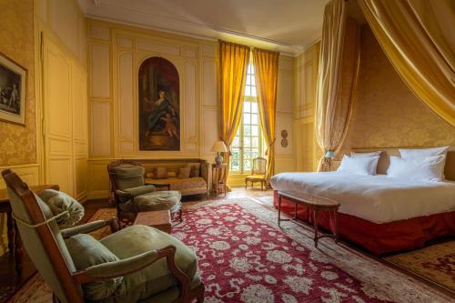 Tempat tidur dalam kamar di Le Château d'Etoges - Champagne