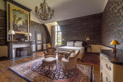 Tempat tidur dalam kamar di Le Château d'Etoges - Champagne