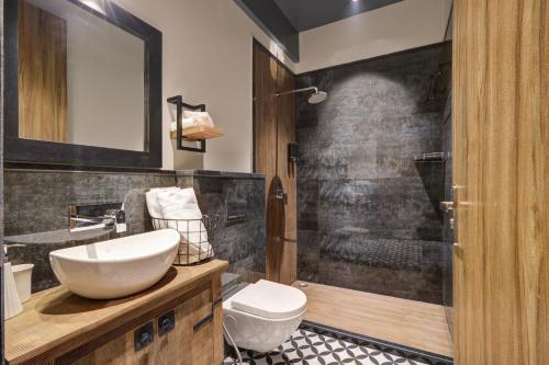 a bathroom with a sink and a shower at The Hanging Villa - A Luxury Pool Villa in Jaipur in Jaipur