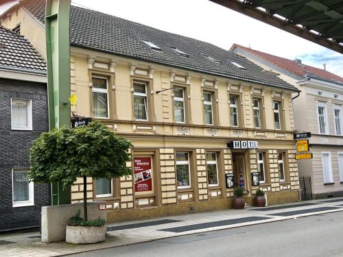 a building on the side of a street at Hotel Schwaferts in Wuppertal