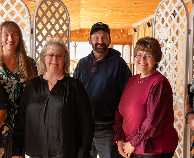 Pitt-Titusville employees (pictured, from left to right: Bill Watson, Patti Jo Young, Chris Hunt, Don Stuck, Dr. Stephanie Fiely and Ted Rougeux), pose for a group portrait to commemorate their milestone work anniversaries.