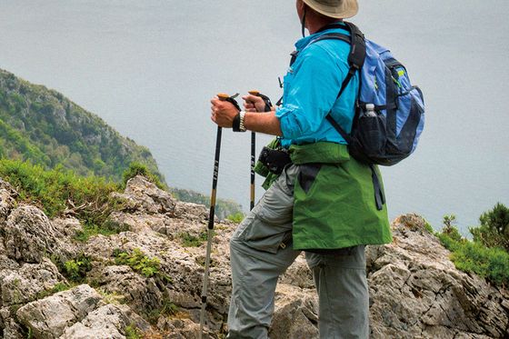 a person hiking along the path of the gods trail in amalfi italy