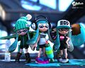 Three Inkling girls, with the center one holding a Splattershot.