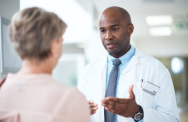 Doctor talking to patient