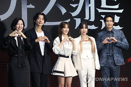 Cast members of Disney 's Korean original series "Red Swan" pose for photos during a press event in Seoul on July 2, 2024. (Yonhap) 