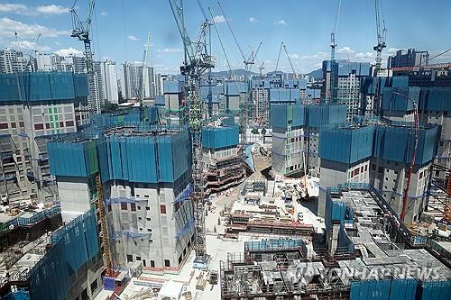 This file photo shows a construction site for apartment buildings in Seoul on June 3, 2024. (Yonhap)