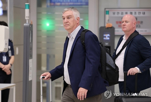This photo taken July 7, 2024, shows Fred Fleitz (2nd from R), vice chair of the Center for American Security at the America First Policy Institute, arriving at Incheon International Airport in Incheon, just west of Seoul. (Yonhap)
