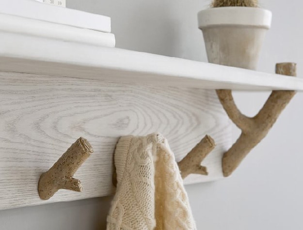 Wall shelf with hooks