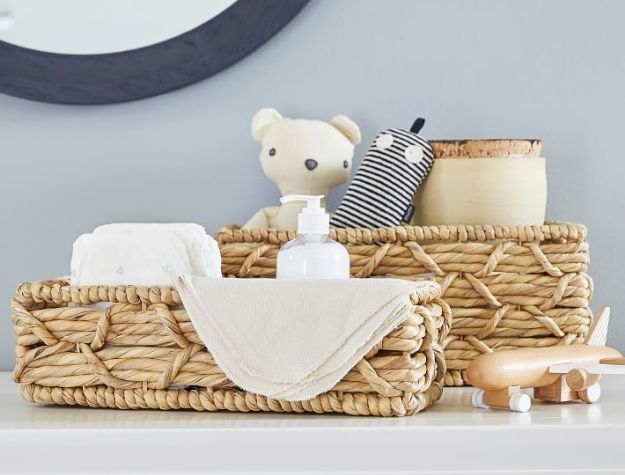 woven nursery storage on top of dresser