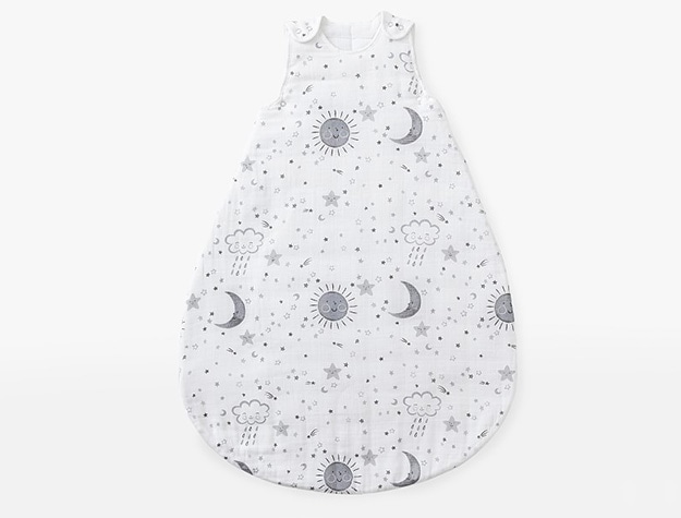 Wearable blanket featuring sun, moon, star and raincloud print.