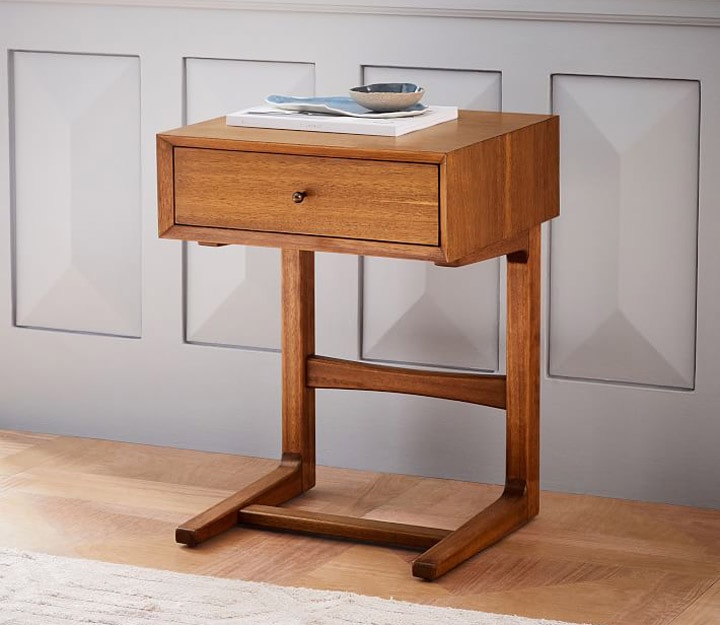 C-shaped wooden nightstand