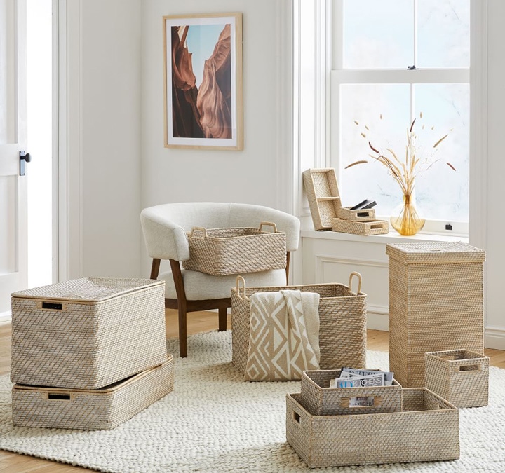 Assortment of woven baskets in living room.