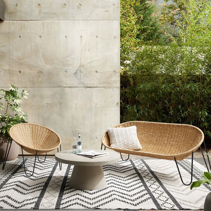 Outdoor loveseat, chair and coffee table.