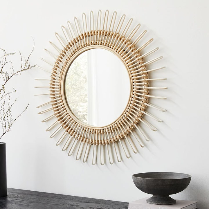 Rattan wall mirror.