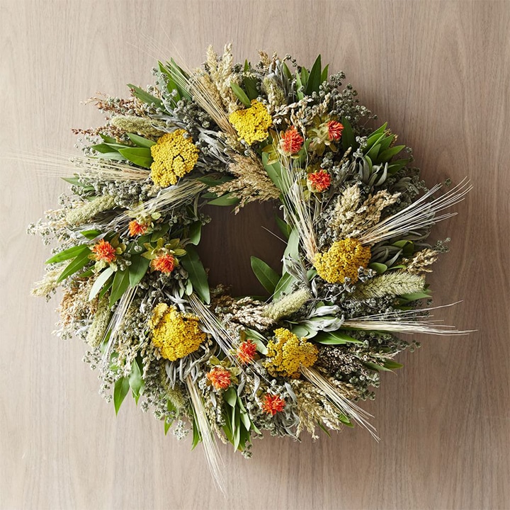 fall flower wreath on door.