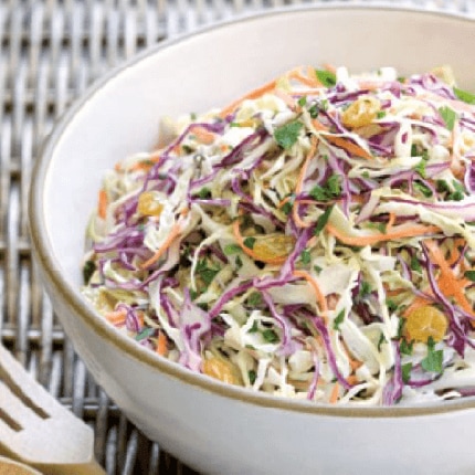 A bowl of buttermilk coleslaw.