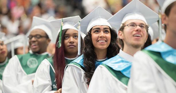 Students wearing caps and gowns