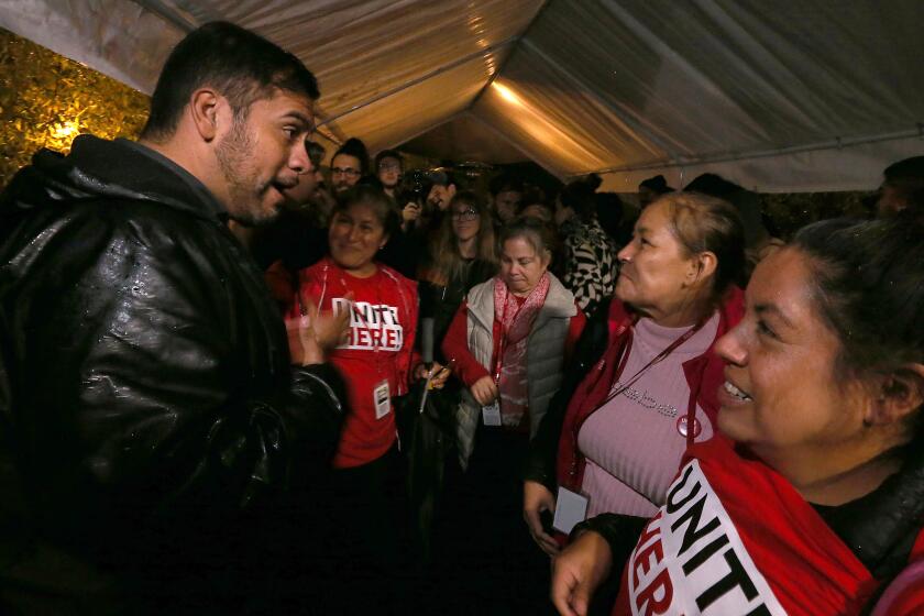 LOS ANGELES, CALIF. - NOV. 8, 2022. Los Angeles City Council candidate Hugo Soto-Martinez gathers with supporters at an election night party in Atwater Village on Tuesday, Nov. 8, 2022. (Luis. Sinco / Los Angeles Times)