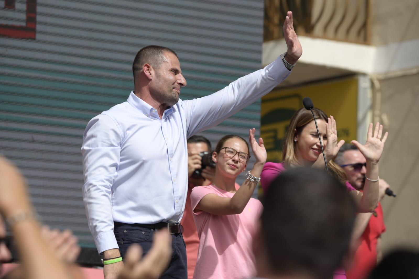 Robert Abela, accompanies by his wife and daughter, waves to the crowd. Photo: Matthew Mirabelli