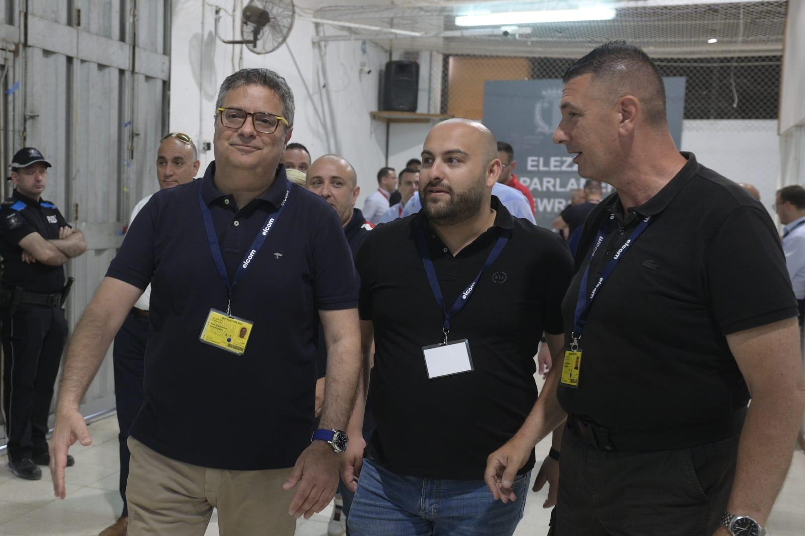 Former PN leader and current MP Adrian Delia (left) enters the counting hall. Photo: Matthew Mirabelli