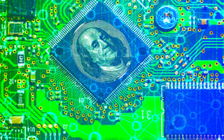 Benjamin Franklin from the 100 dollar bill superimposed on a computer processor representing the rise in fintech jobs.