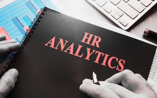 HR analytics written on the cover of a notebook