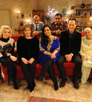 The Kumars. Image shows from L to R: Emilia Fox, Caroline Quentin, Ashwin (Vincent Ebrahim), Hawney (Harvey Virdi), Sanjeev (Sanjeev Bhaskar), Richard E. Grant, Ummi (Meera Syal). Copyright: Hat Trick Productions / Avatar