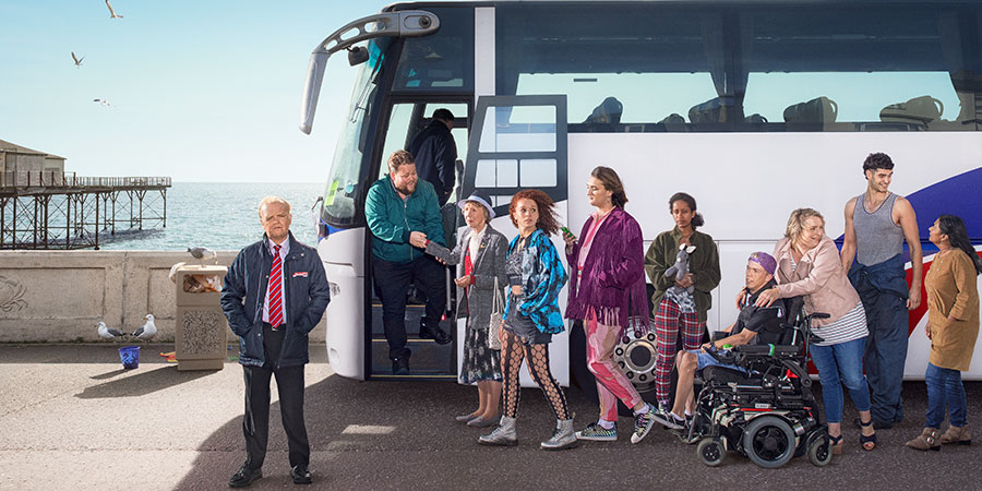 Don't Forget The Driver. Image shows from L to R: Peter Green (Toby Jones), Squeaky Dave (Danny Kirrane), Joy (Marcia Warren), Kayla (Erin Kellyman), Bradley (Jo Eaton-Kent), Rita (Luwam Teklizgi), Kieran (Wills Whittington), Fran (Claire Rushbrook), Lech (Dino Kelly), Manju (Bharti Patel)