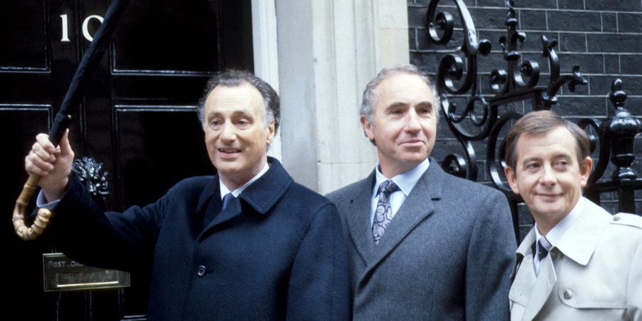 Yes, Prime Minister. Image shows from L to R: James Hacker (Paul Eddington), Sir Humphrey Appleby (Nigel Hawthorne), Bernard Woolley (Derek Fowlds)