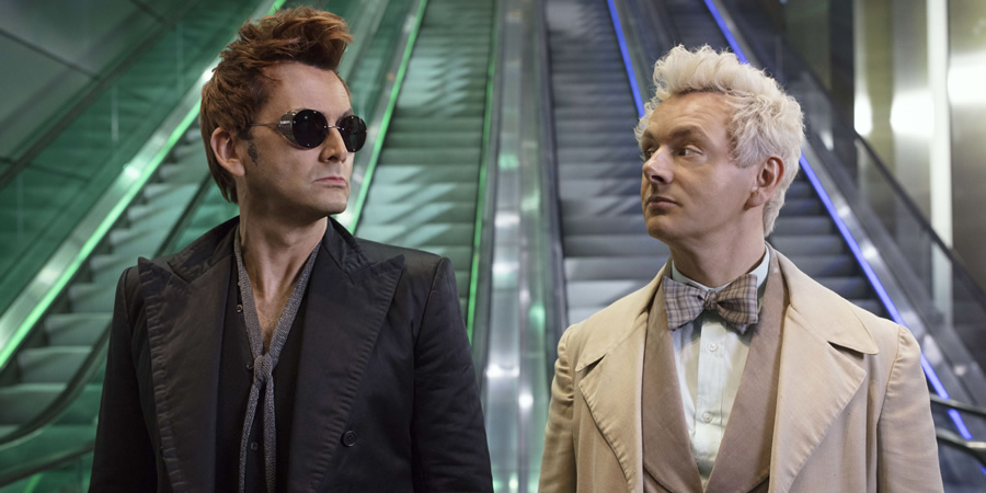 Good Omens. Image shows from L to R: Crowley (David Tennant), Aziraphale (Michael Sheen)