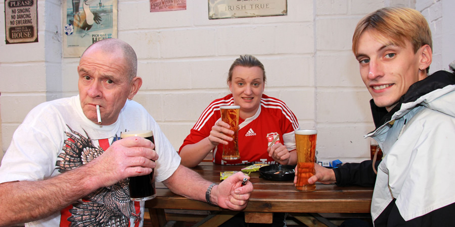 This Country. Image shows from L to R: Steve 'Uncle Nugget' Nuggins (David Nightingale), Kerry Mucklowe (Daisy May Cooper), Lee 'Kurtan' Mucklowe (Charlie Cooper). Copyright: BBC