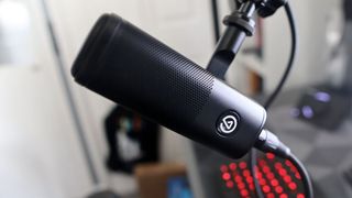 A Elgato Wave DX microphone mounted on a stand