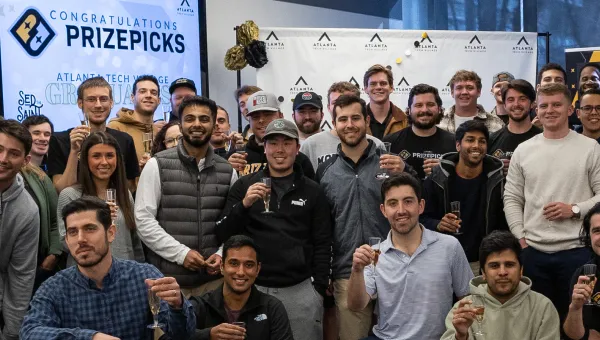 prizepicks staff drinking champagne