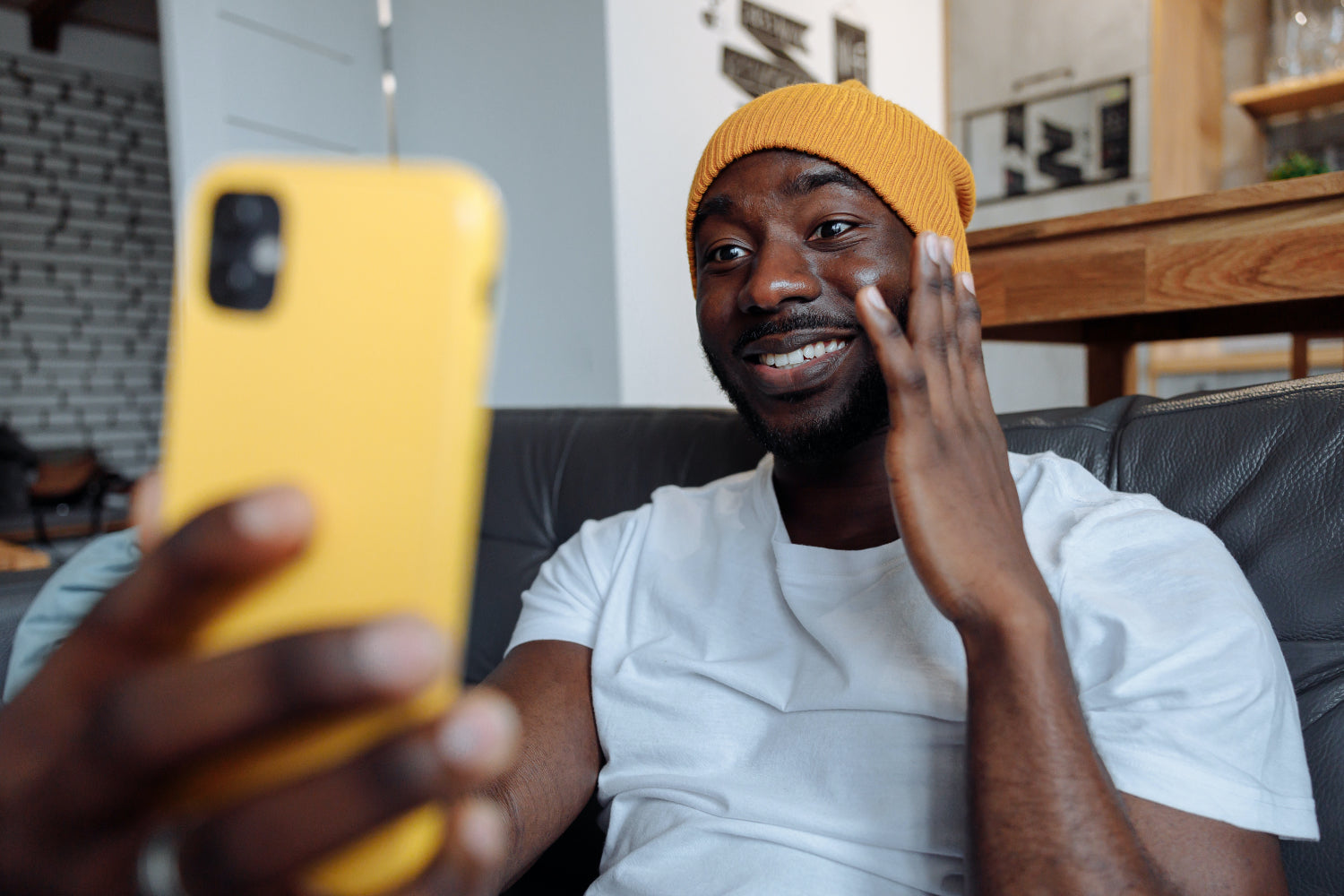 Person performs for an audience through a mobile phone livestream