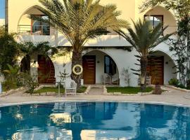 Palm Djerba Suites, hotel in Mezraya