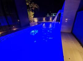 Staycation @ Sandari Batulao، فندق في تاجيتاي