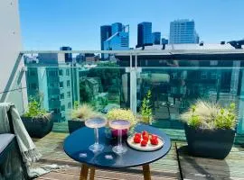 City Heart Apartment with a Sunny Rooftop Terrace