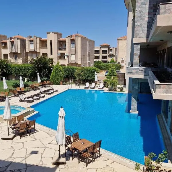 Panacea Suites Hotel, hotel in Naj‘ ‘Azzām