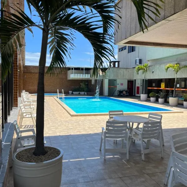 Apartamento com vista da praia da Costa 615, hotel em Camburi