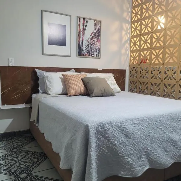 Apartamento a uma quadra do mar - Bairro Itapuã, hotel en Camburi