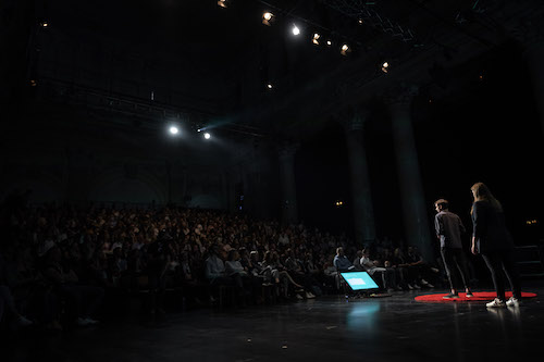 David speaking on stage.