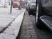 photo of a granite curb and brick-lined gutter on District street