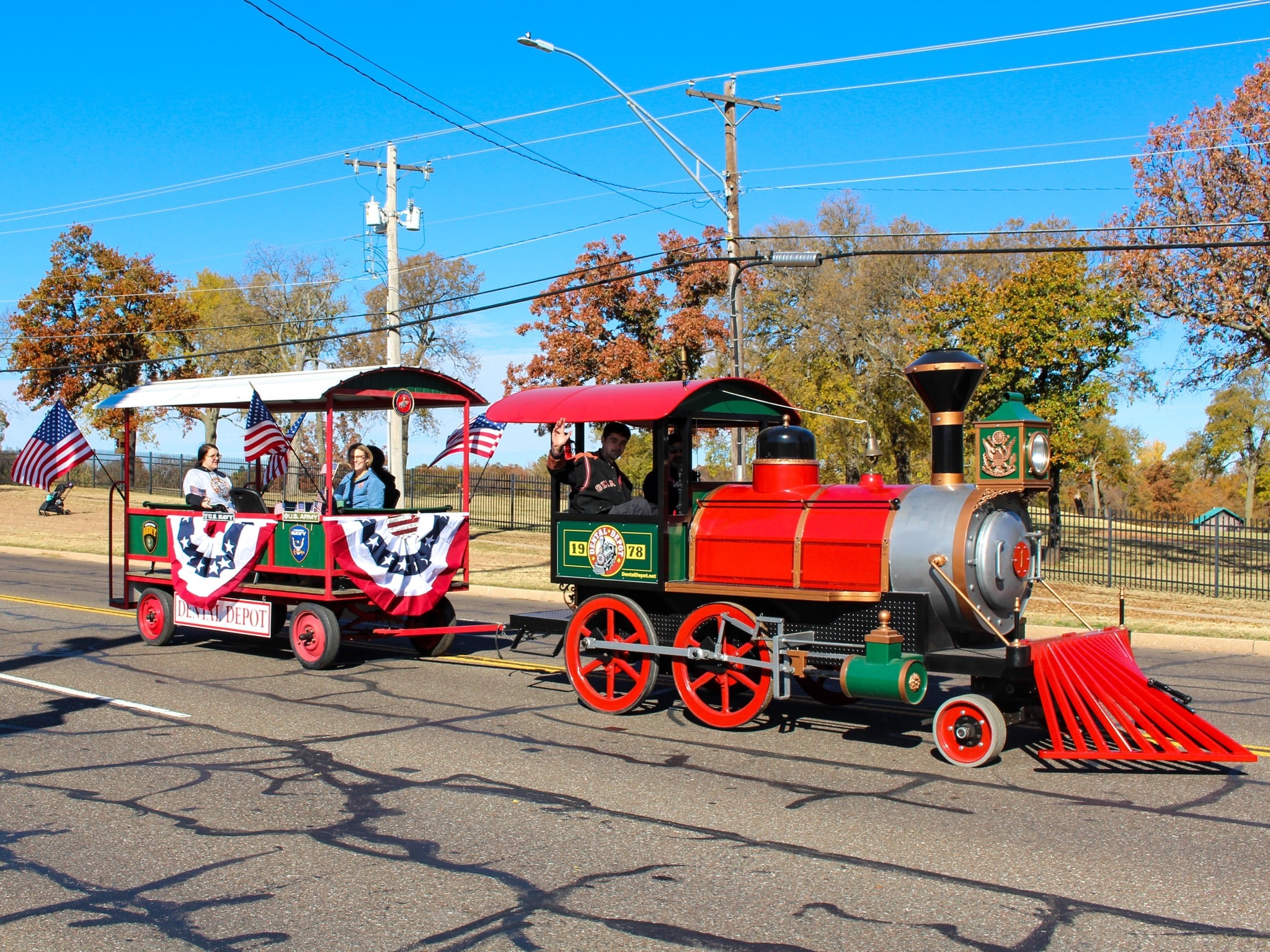 Dental Depot's train going down the road in a parade.