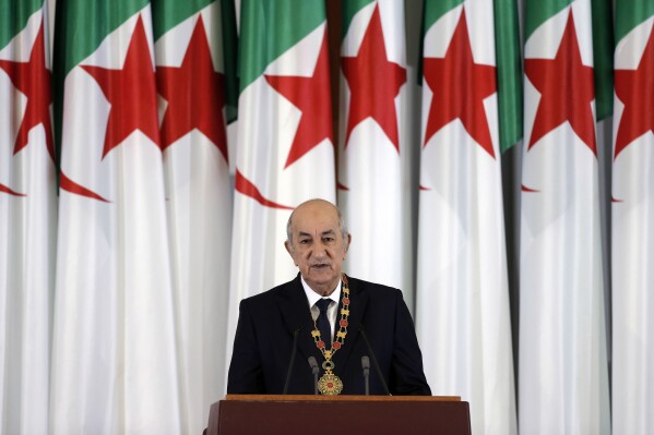 FILE - Algerian president Abdelmadjid Tebboune delivers a speech during an inauguration ceremony in the presidential palace, in Algiers, Algeria, on Dec. 19, 2019. Algeria's president announced on Thursday July 11, 2024 that he intends to run for a second term in office, five years after ascending to power as the military and establishment-backed candidate amid widespread pro-democracy street protests. (AP Photo/Toufik Doudou, File)