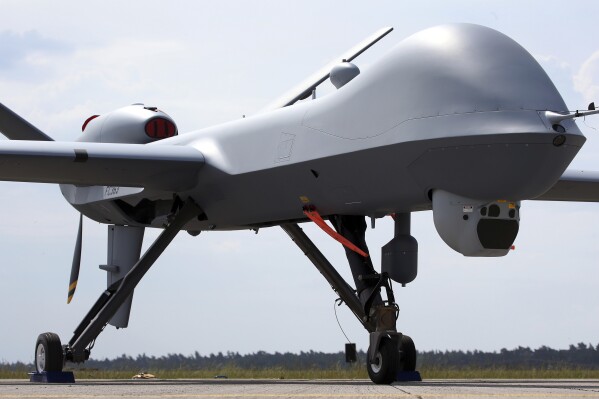 An MQ9 Predator drone is displayed at the Berlin Air Show ILA in Berlin, Germany, on May 30, 2016. China on Thursday, April 11, 2024 announced sanctions against two U.S. defense companies, one of which produces the Predator drone, over what it says is their support for arms sales to Taiwan, the self-governing island democracy Beijing claims as its own territory to be recovered by force if necessary. (AP Photo/Michael Sohn, File)