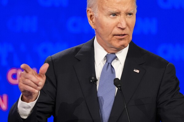 FILE - President Joe Biden, speaks during a presidential debate hosted by CNN with Republican presidential candidate former President Donald Trump, June 27, 2024, in Atlanta. Political opponents, armchair pundits and even nervous supporters are demanding that President Joe Biden undergo cognitive testing after his dismal debate performance – even though his physician says he gets, and passes, an annual neurologic exam. (AP Photo/Gerald Herbert, File)